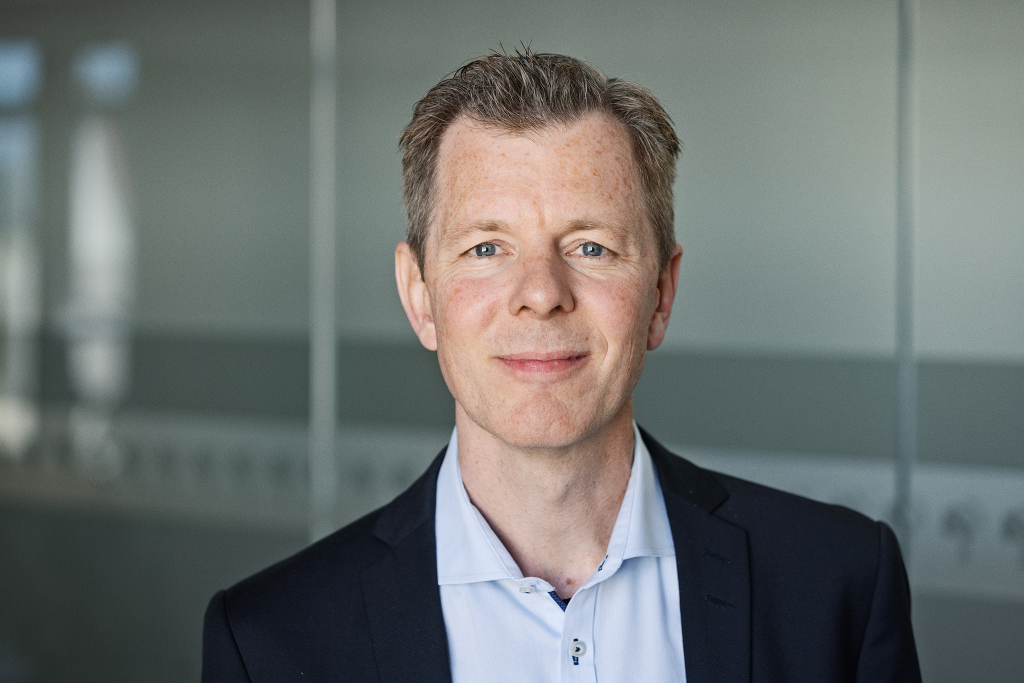 Portræt af pressechef Laurits Harmer Lassen