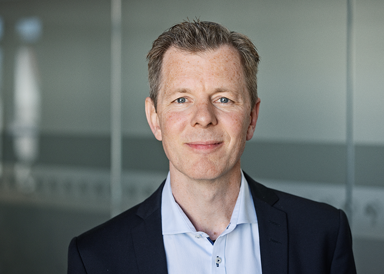 Portræt af pressechef Laurits Harmer Lassen